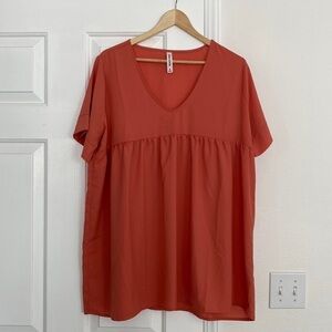 Zenana baby doll tunic in soft peach.